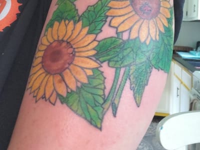 Rite of Passage Tattoo Inc