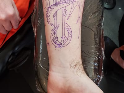 Rite of Passage Tattoo Inc