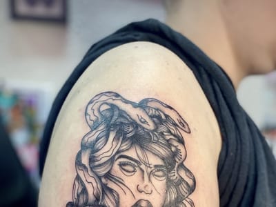 Rivalry Tattoo and Piercing