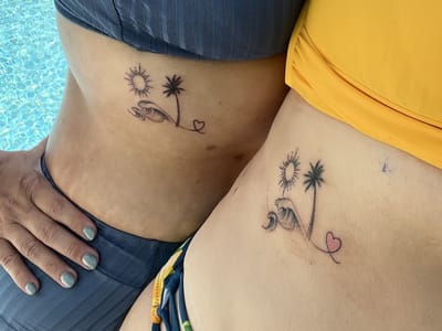 Rock And Roll Tattoo ,Piercing ,Laser removal