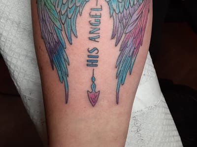 Rockin' Horse Tattoo & Piercing