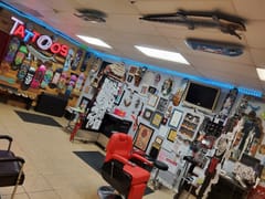 Rose And Dagger Tattoo Studio