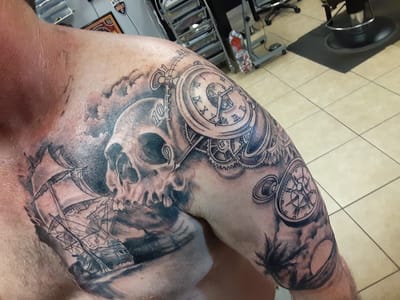 Rose And Dagger Tattoo Studio