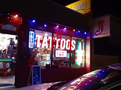 Rose And Dagger Tattoo Studio