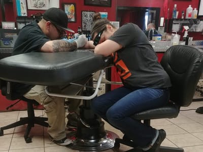 Rusty's Needles Tattoo