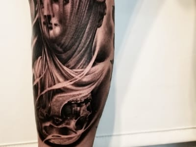 Sacred Art Tattoo