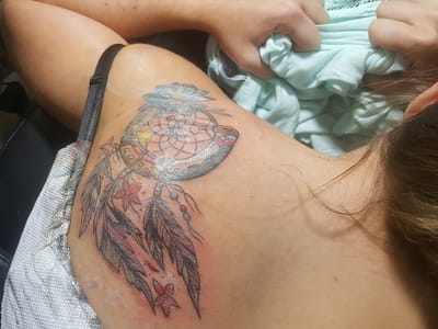 Sacred Dagger Tattoo Studio