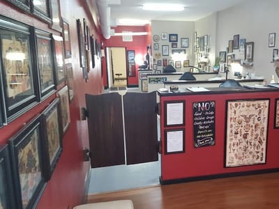 Sacred Dagger Tattoo Studio