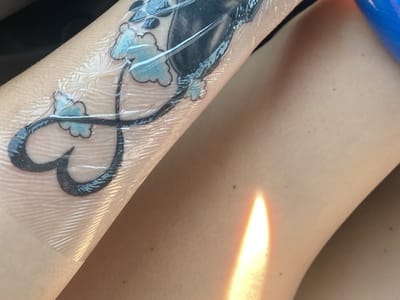 Sacred Owl Tattoo Studio