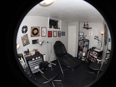 Scarlet Raven Tattoo