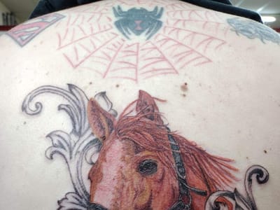 Sideshow Tattoo and Piercings