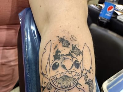 Sideshow Tattoo and Piercings