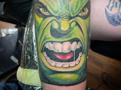 Sideshow Tattoos & Piercings