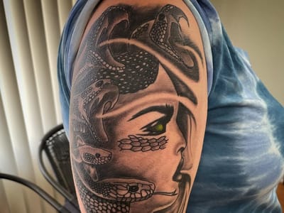 Sideshow Tattoos & Piercings