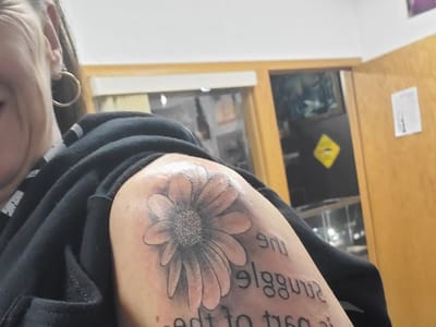 Silver Tuna Tattoo and Piercing