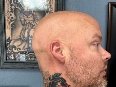 Silver Tuna Tattoo and Piercing