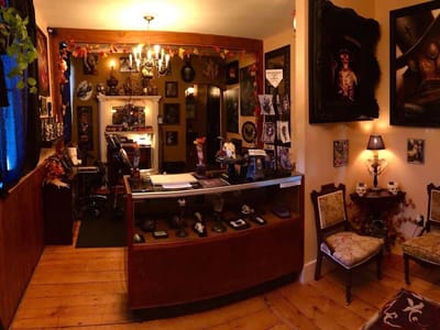 Skull and Snake Tattoo Studio Art Gallery