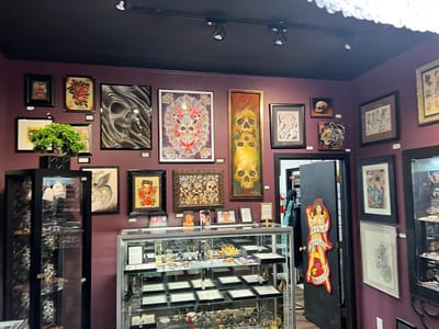 Slave to the Needle Tattoo & Body Piercing