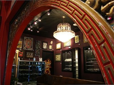 Slave to the Needle Tattoo & Body Piercing