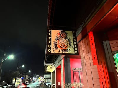 Slave to the Needle Tattoo & Body Piercing