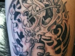 Smokin Guns Tattoo and Body Piercing