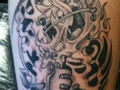 Smokin Guns Tattoo and Body Piercing