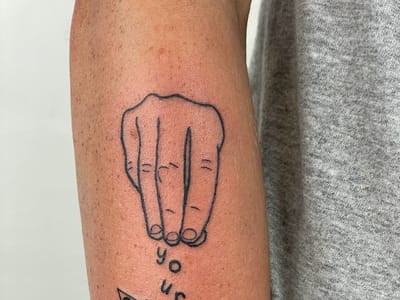 Spoken Hand Tattoo