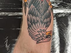 Square Rose Tattoo & Piercing