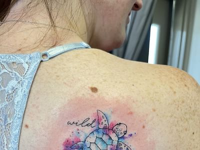 Surly goat tattoo and piercing