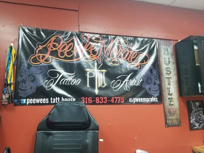 Symbolic Tattoo & Piercings