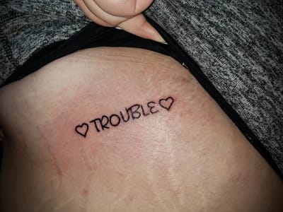 Taboo Tattoos and Piercings