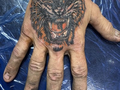 Tap’s Electric Iron Tattoo & Piercing