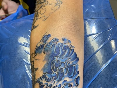 Tap’s Electric Iron Tattoo & Piercing