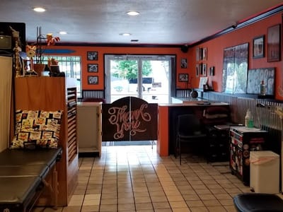 THE AMBER ROSE TATTOO PARLOR