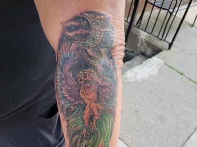 The Curly Wolf Tattoo Club