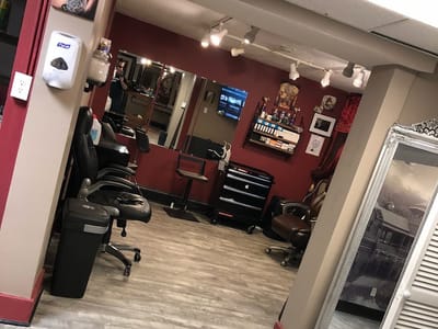 The Curly Wolf Tattoo Club