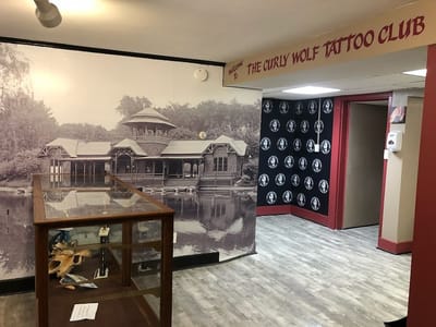 The Curly Wolf Tattoo Club