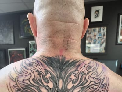 The Iron Dragon Tattoo Collective