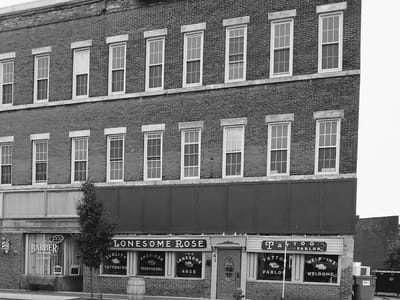 The Lonesome Rose Tattoo Parlor