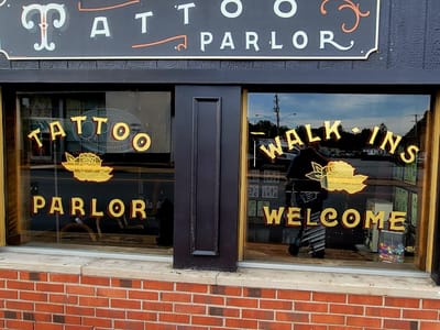 The Lonesome Rose Tattoo Parlor