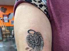 The Painted Sparrow Tattoo Shop And Art Gallery