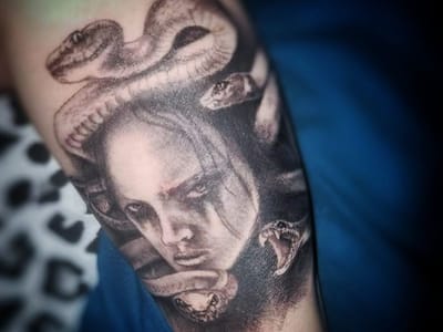 The Rusty Needle Tattoo Parlor