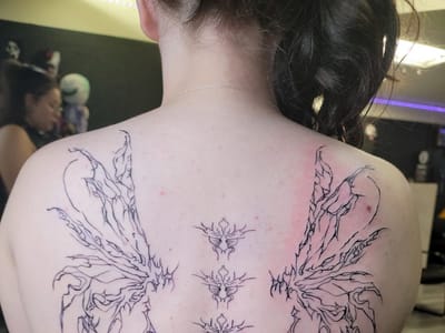 Tilted Crown Tattoos & Piercings