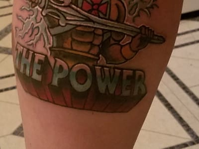 Tooth And Claw Tattoo