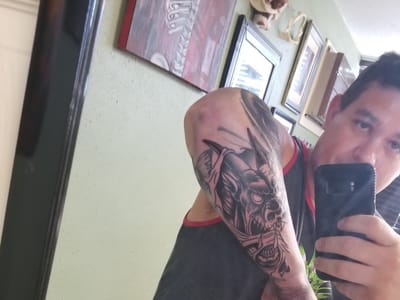 Tooth And Claw Tattoo