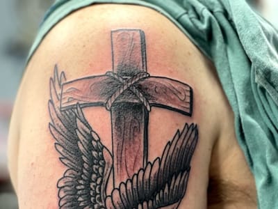 Triumph Tattoo Company