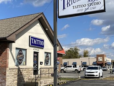 Triumphant arts tattoo studio