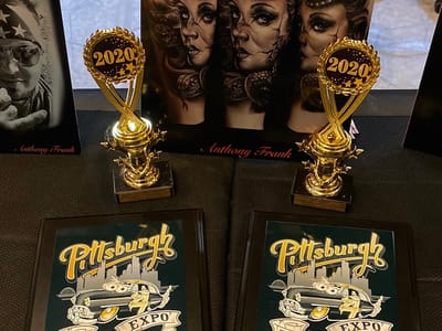 Triumphant arts tattoo studio