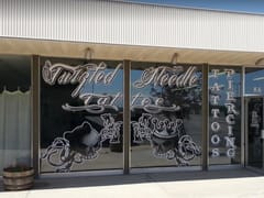 Twizted Needle Tattoo