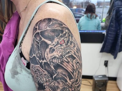 Under The Gun Tattoos